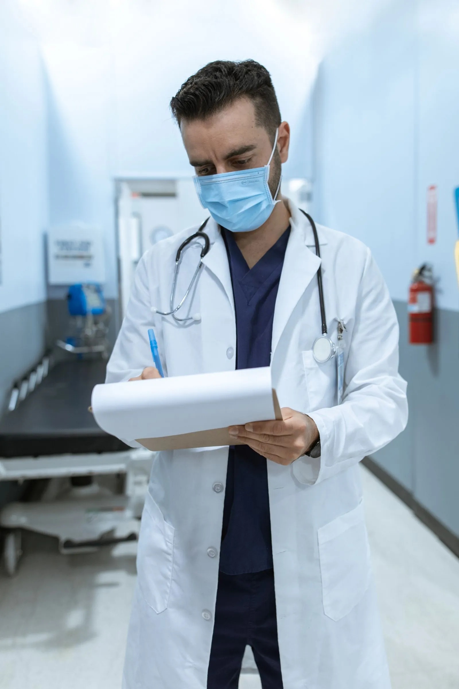 Healthcare member services professional on a headset in a bright office